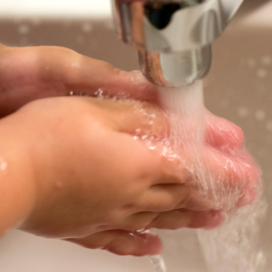 Toddler Washing Hands with Natural Soap
